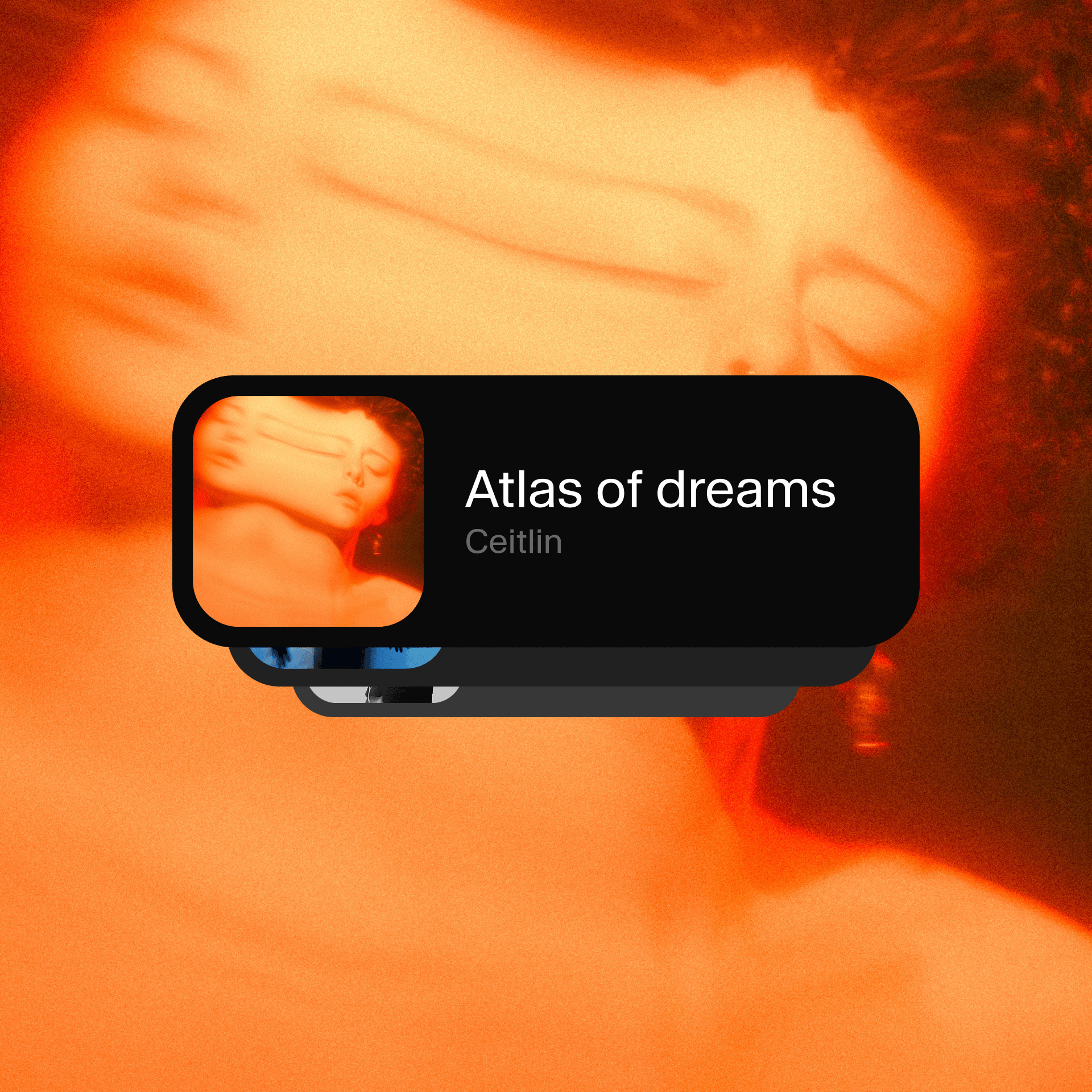 Abstract blurred orange figure with title "Atlas of dreams" by Ceitlin.